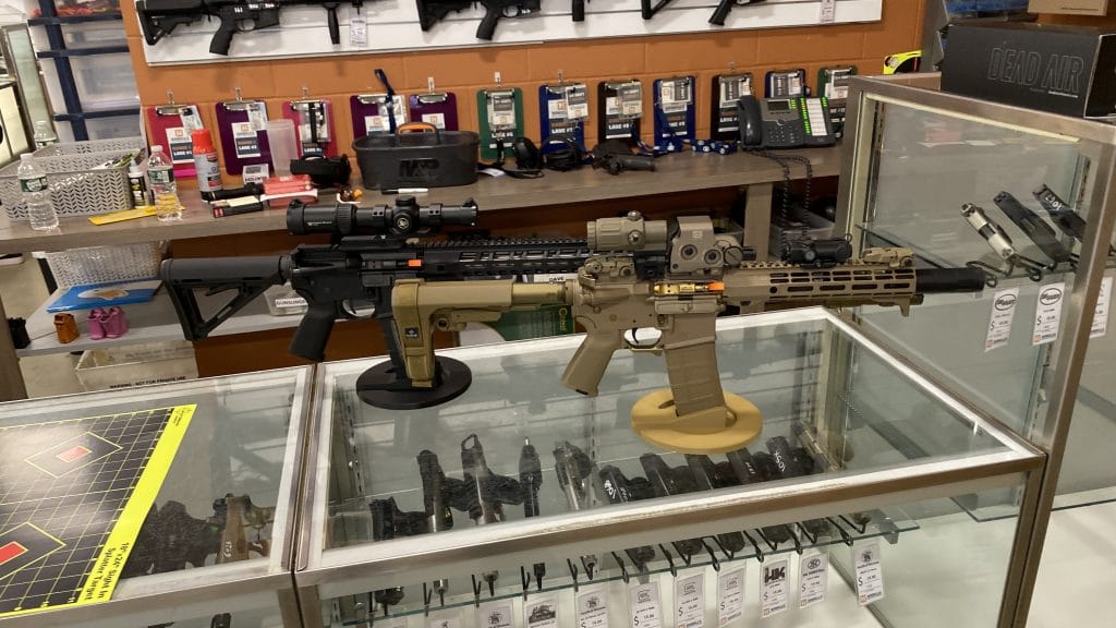 tan black ar15 pistol rifle gun store scaled
