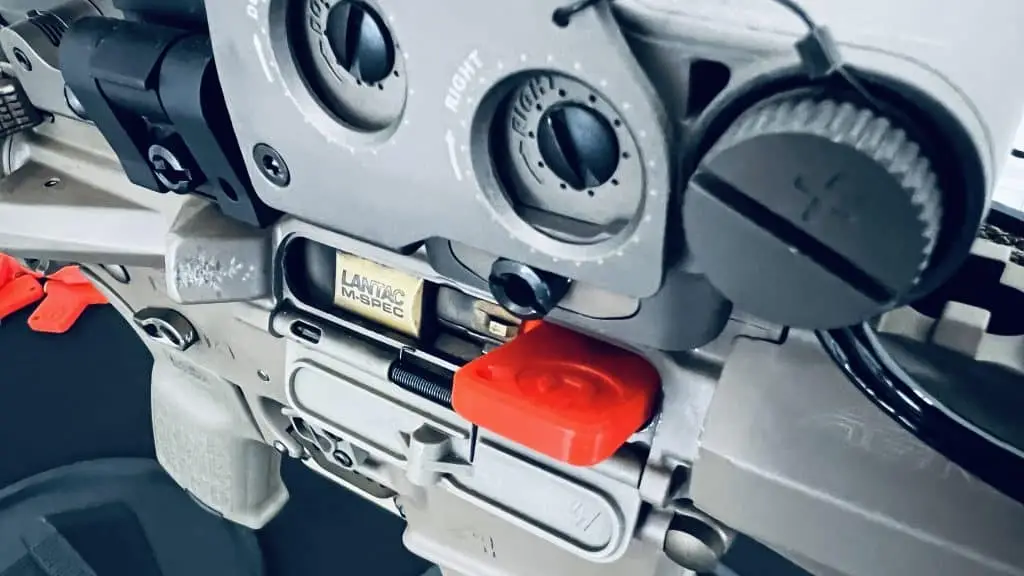 ejectable safety in rifle scaled