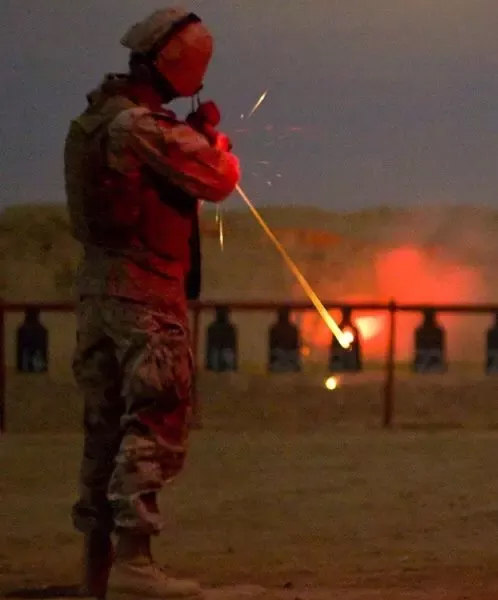 Man Shooting Tracer Ammunition